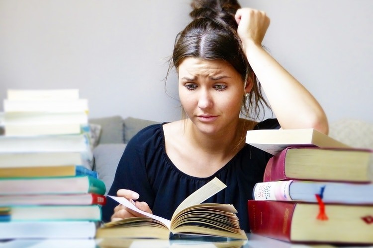 stressed woman reading book