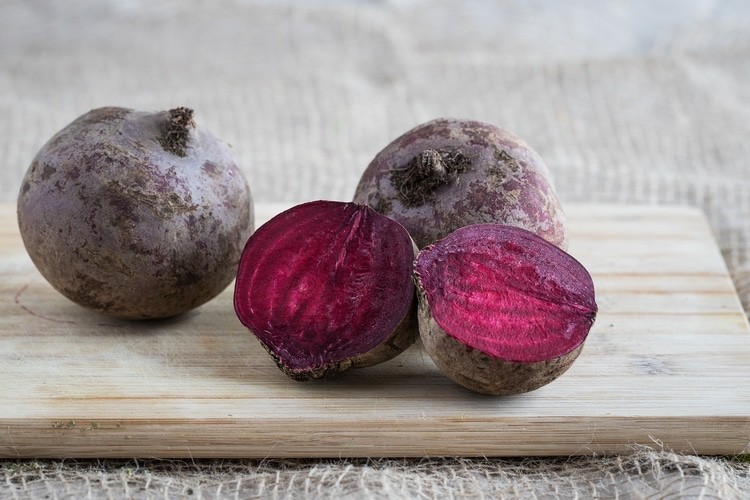 beets and hormone balance - beetroot sitting on cutting board