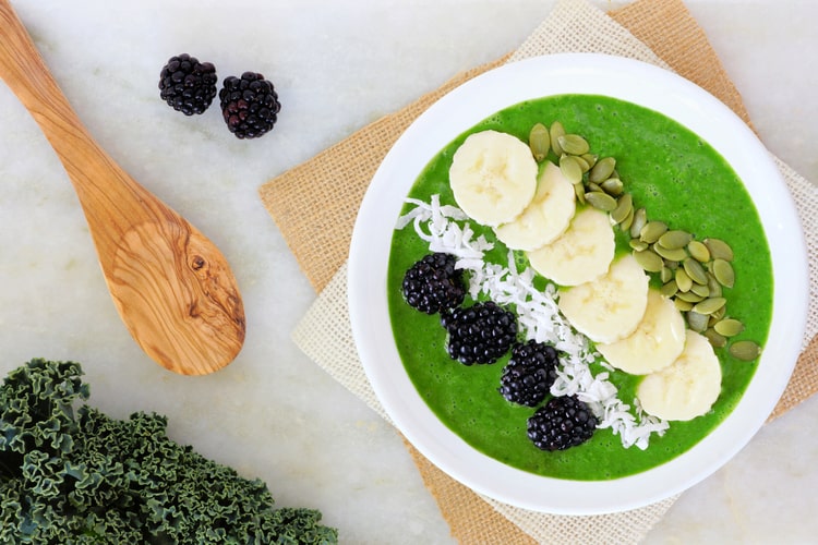 smoothie bowl topped with fruit