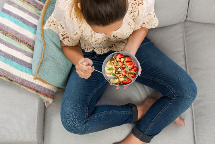 weight loss checklist woman eating healthy bowl