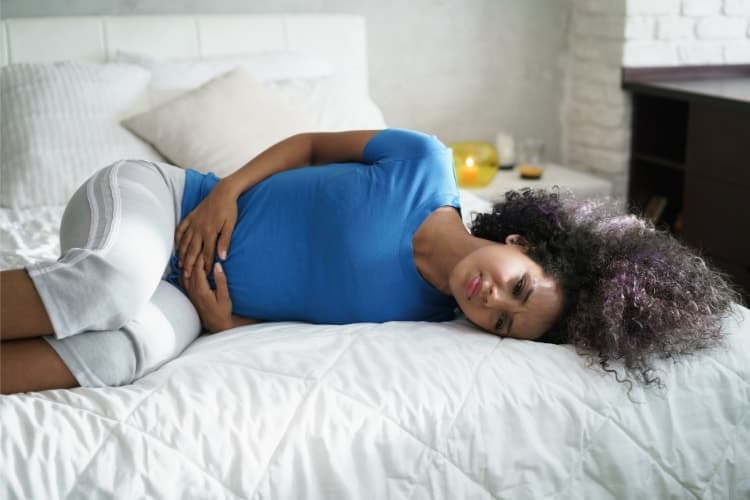 How To Sleep With Menstrual Cramps: 10 Tips To Get Relief and Feel Rested