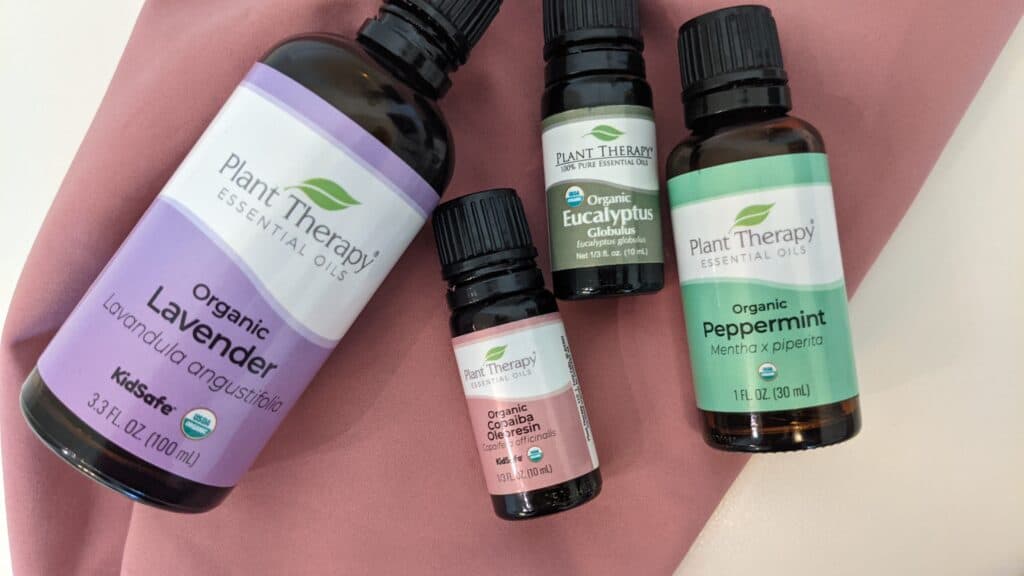 bottles of essential oils to use with eucalyptus for painful menstrual cycles