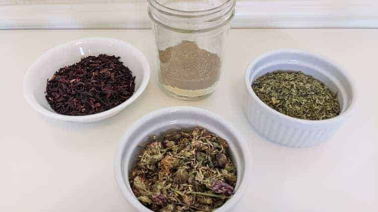 best herbs to infuse in oil for hair growth - nettle, hibiscus, red clover, fenugreek, aloe vera