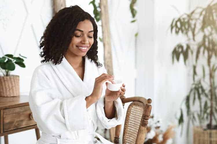 woman applying cream