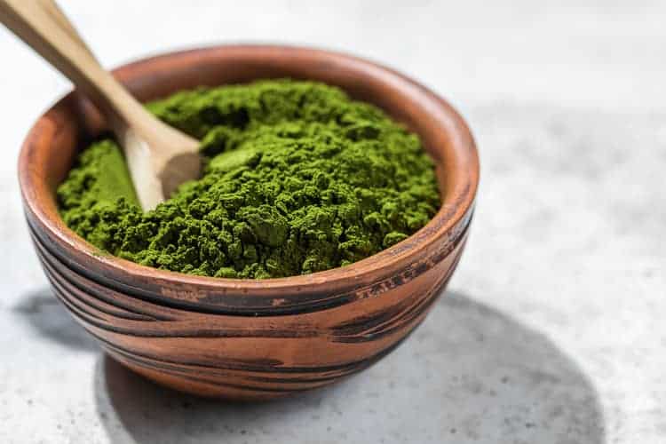 bowl of green powder without spirulina