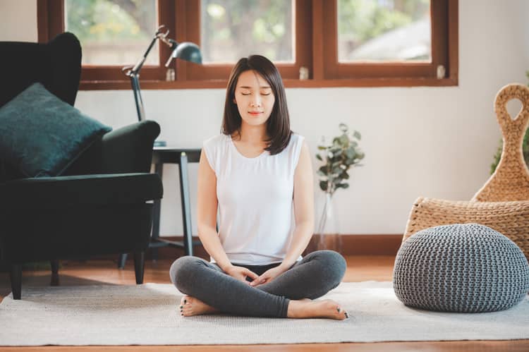 young woman meditating