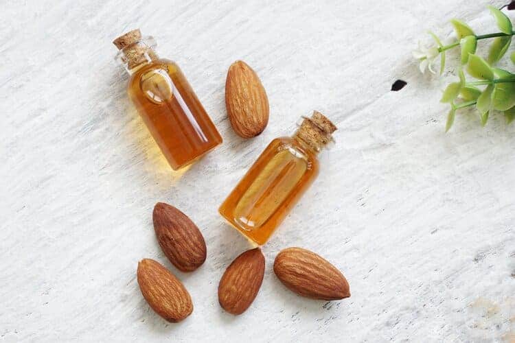 almond oil and whole nuts for dry skin