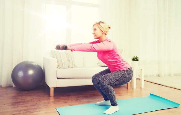 woman doing squat exercise